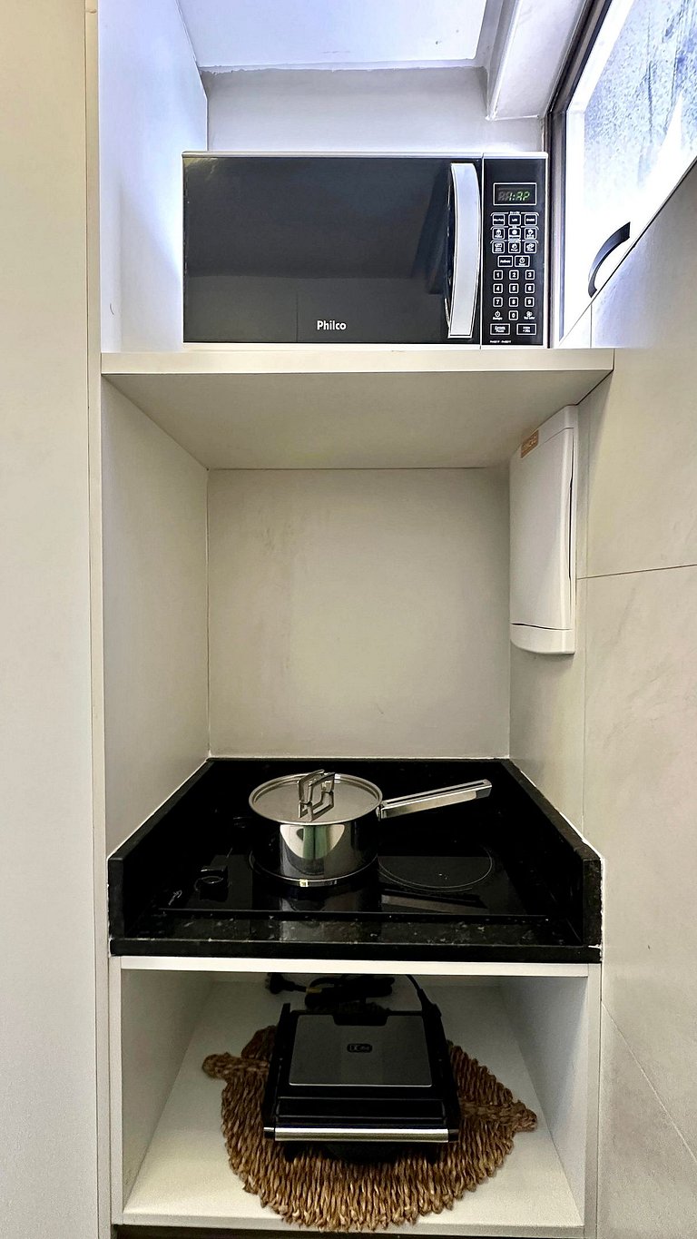 (1406) Studio Elegante com Vista Mar